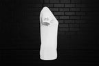 Side view of white No Talking women's slim fit graphic tee in premium cotton against a black brick wall background.