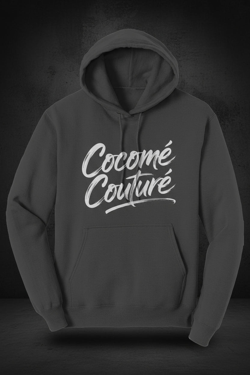 Front view of black CocoMe Couture Unique Look Hoodie with white script logo, combining minimalist design with bold branding.
