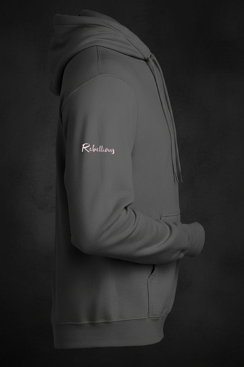 Side view of gray CocoMe Couture Unique Look Hoodie showing 'Rebellious' text embroidered on the sleeve in light pink.
