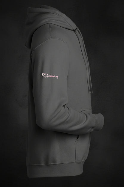 Side view of gray CocoMe Couture Unique Look Hoodie showing 'Rebellious' text embroidered on the sleeve in light pink.