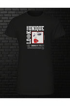 Black 100% cotton tee with 'Unique Look' graphic featuring a woman's face and red lips on a black brick wall.