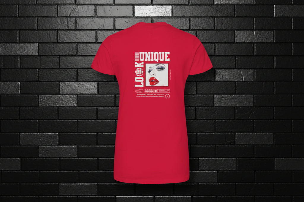 Back view of a red premium cotton tee with 'Unique Look' graphic against a black brick wall background.