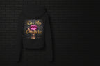 Back view of a black Kiss My Couture luxe streetwear hoodie featuring a pink lips graphic and gold script lettering.