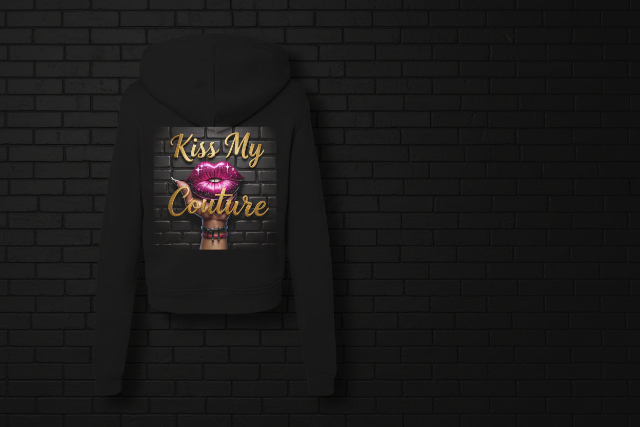 Back view of a black Kiss My Couture luxe streetwear hoodie featuring a pink lips graphic and gold script lettering.