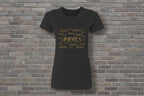 Aries the Ram Premium Tee in black featuring a gold metallic astrology graphic on a brick wall background.