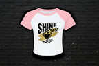 Women's 90s style Y2K raglan baby tee in pink and white micro rib with Shine Bright diamond graphic.