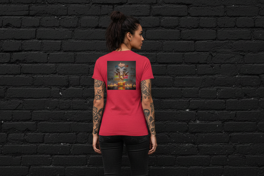 Back view of a woman wearing the red Aries Zodiac graphic t-shirt in heavyweight cotton against a black brick wall.