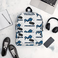 White and blue rebel-luxe laptop backpack with Pretty But A Problem graphic, shown with school and travel essentials.