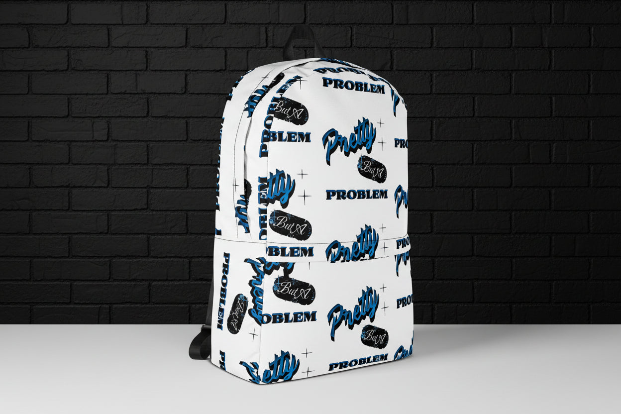 White water-resistant 15-inch laptop backpack with blue and black graphic print against a dark brick wall.