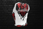 Back of women's Heartless crop top streetwear with red dripping heart and barbed wire print on a black brick background.