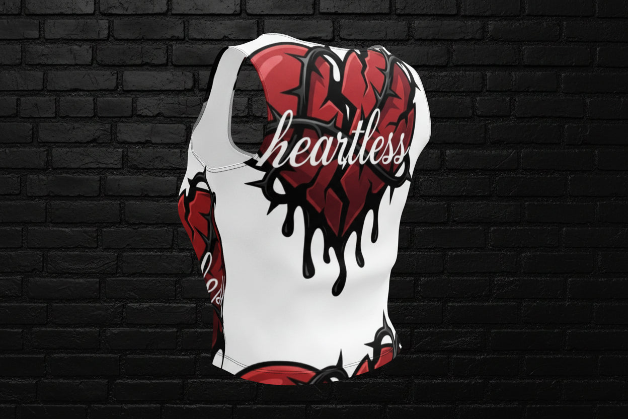 Back of women's Heartless crop top streetwear with red dripping heart and barbed wire print on a black brick background.