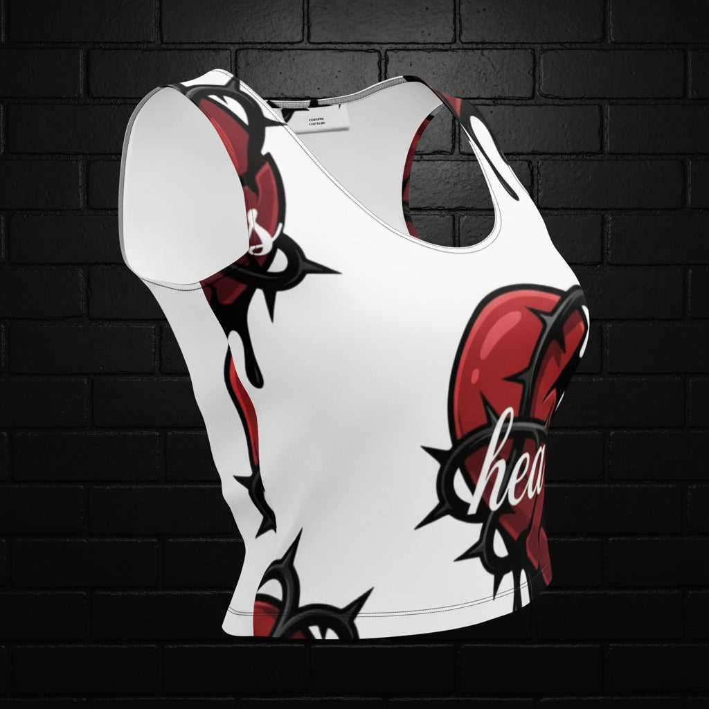 Women's Heartless crop top by Cocome Couture with a red heart and thorns all-over print on a white streetwear activewear tank.