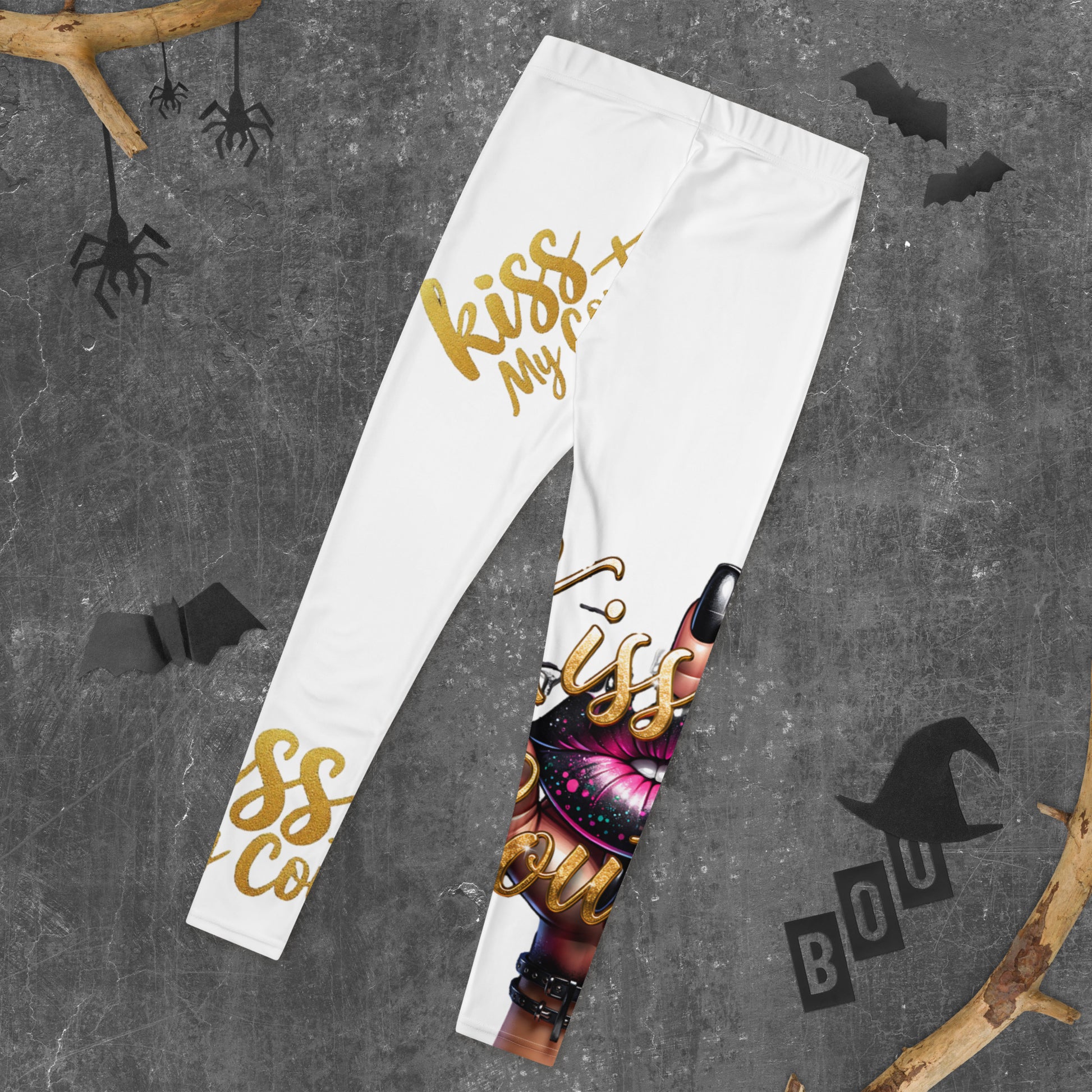 Kiss My Couture Leggings with bold gold script and vibrant lip graphic on white fabric, ideal for stylish activewear or statement streetwear.