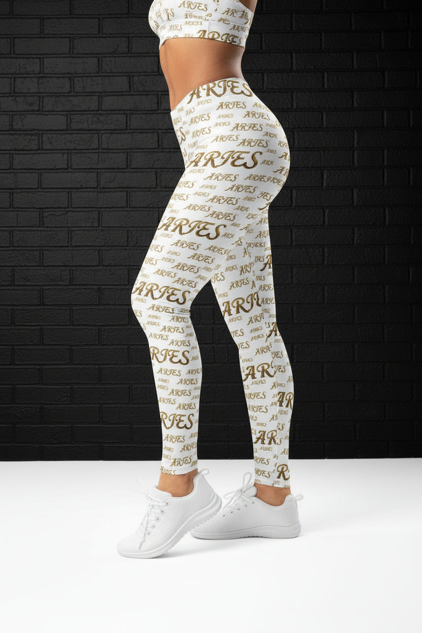 Side view of model in Golden Aries high waisted yoga leggings with all-over zodiac print on white microfiber yarn.