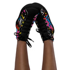 Top-down view of Cocome Couture high-top canvas sneakers featuring vibrant streetwear graphics and black laces.